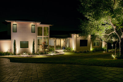 Gorgeous two-story home with beautiful curb appeal lighitng and landscape lighting